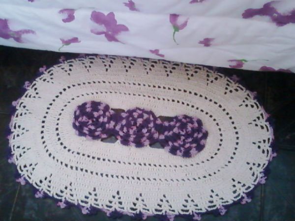 Tapete oval com flores